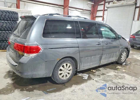 2010 Honda Odyssey Exl z USA, uszkodzony, nr VIN 5FNRL3H69AB064291